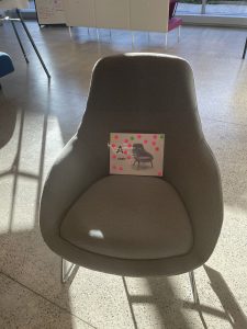 soft seating chair labeled A on display in event space