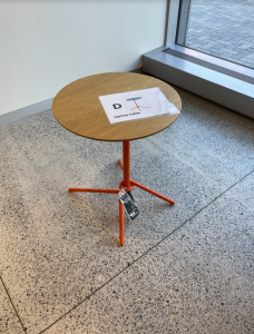 laptop table with identifying label D on display 