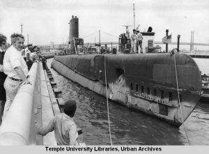 Submarine docking at marina