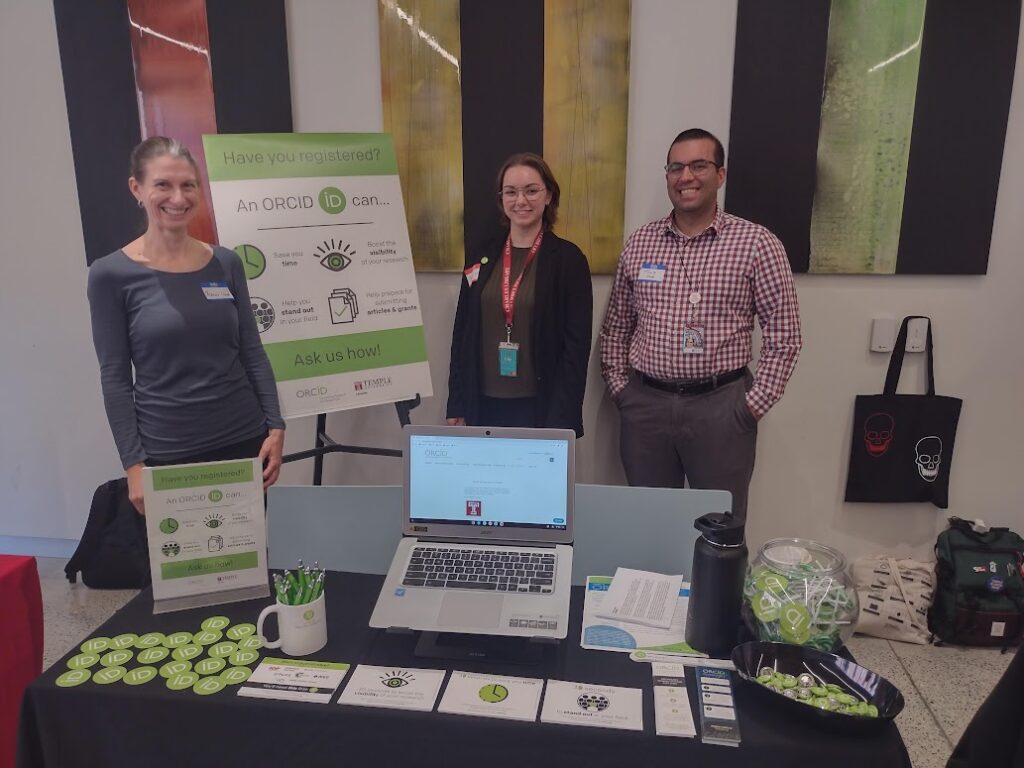 library staff members at the ORCID information table