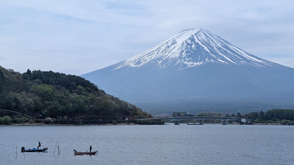 Fishermen on the lake with Mt. Fuji in the background
