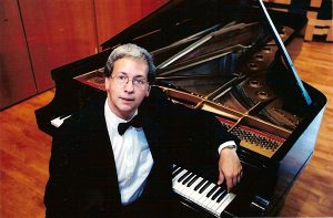 Charles Abramovic at the piano