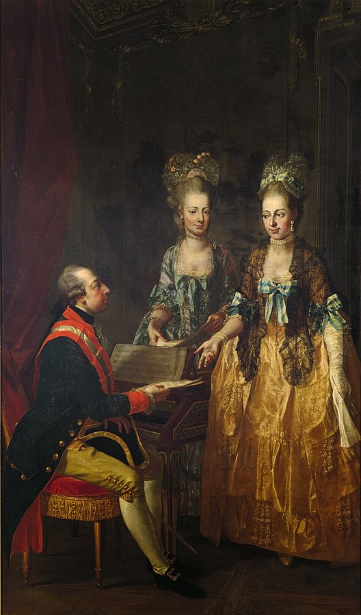 "Portrait of Emperor Joseph II at the spinet with his sisters Maria Elisabeth and Maria Anna," painted by Joseph Hauzinger, dating from 1778. Joseph, resplendently dressed, sits at a small keyboard instrument and fingers some sheet music while looking up his sisters. They, too, are magnificently dressed, and one of them appears also to be holding some music.