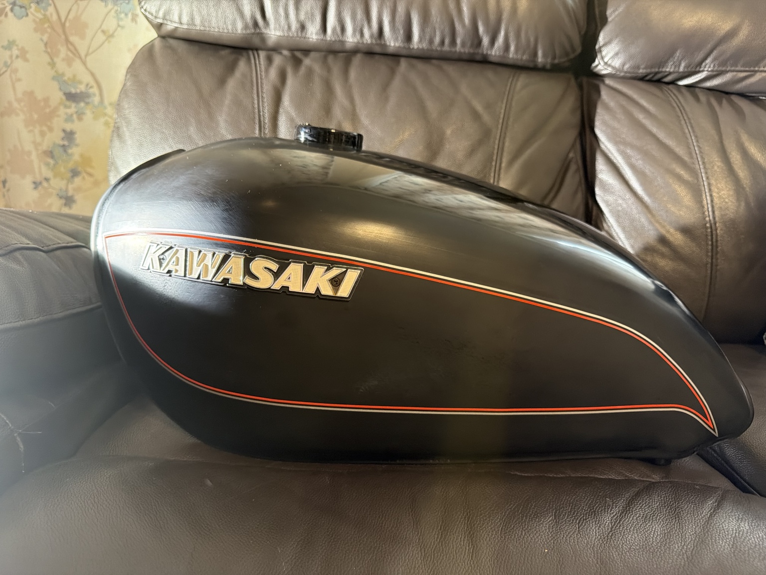 Ol' Beauty's black fuel tank with red and white pinstripes before clear coat.