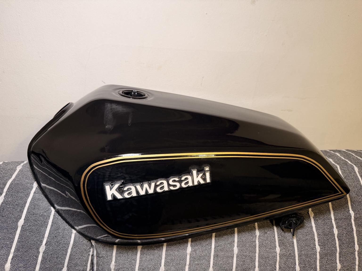 Opposite side of Lil' Beasty's finished black and gold fuel tank.