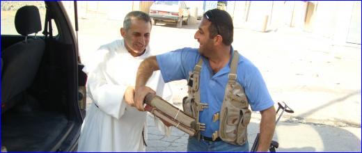 Iraqi Dominican Friar Najeeb Michaeel handing over manuscripts in Erbil, Iraq, Summer 2014, Photo: Jacques Charles-Gaffiot