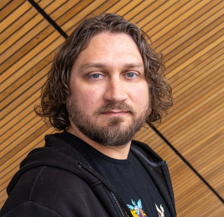 A headshot of Jordan Hample