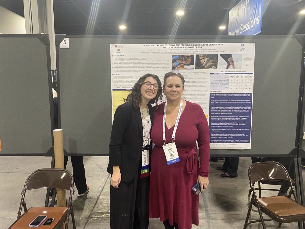 Dr. Sarah Bass and RCL Research Coordinator Katie Singley presenting a poster at APHA Conference, 2024